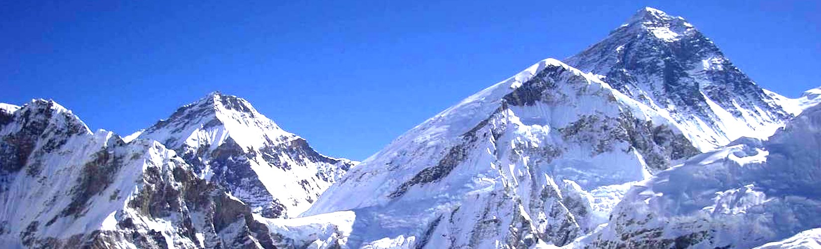 A Panoramic View of Mountains Like Nuptse (7,861), Khumbutse (6,665 m), and Pumori (7,165 m).